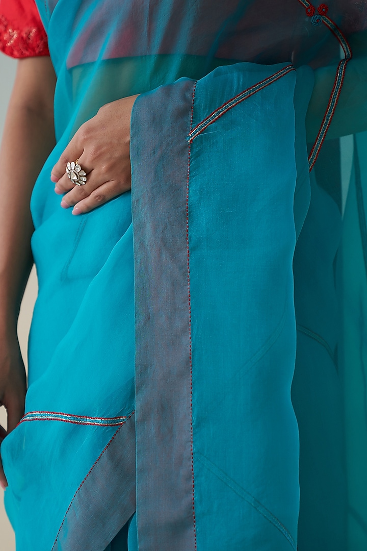 Turquoise Organza Embroidered Wedding Saree by JANKI INDIA at Pernia's Pop Up Shop