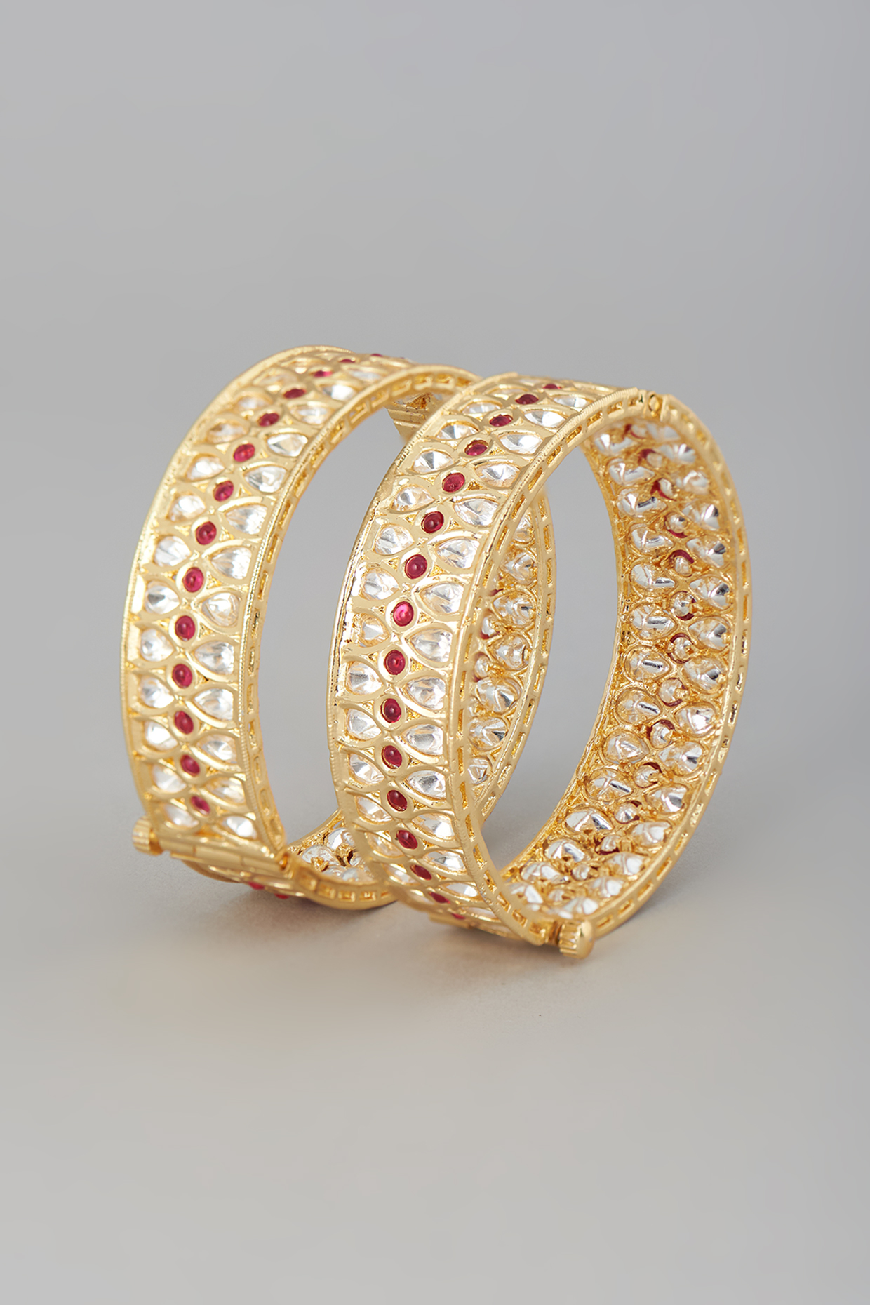 Gold Finish Kundan Polki & Ruby Stone Bangles (Set of 2) by Johori