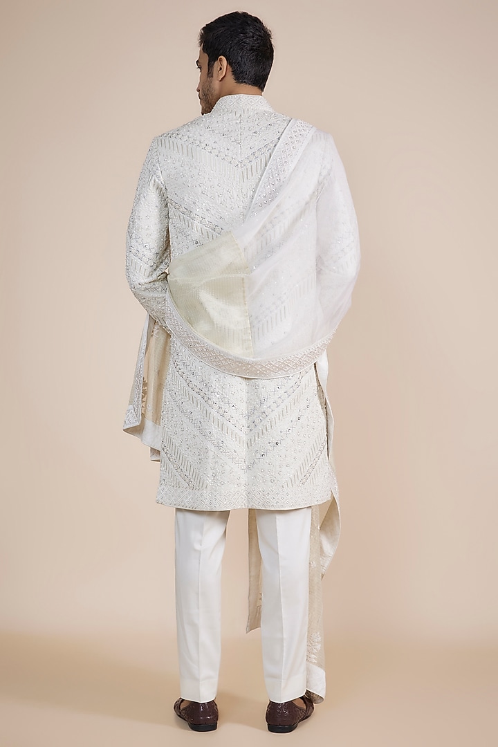 Ivory Silk Thread Embroidered Sherwani With Stole by Sarab Khanijou at Pernia's Pop Up Shop