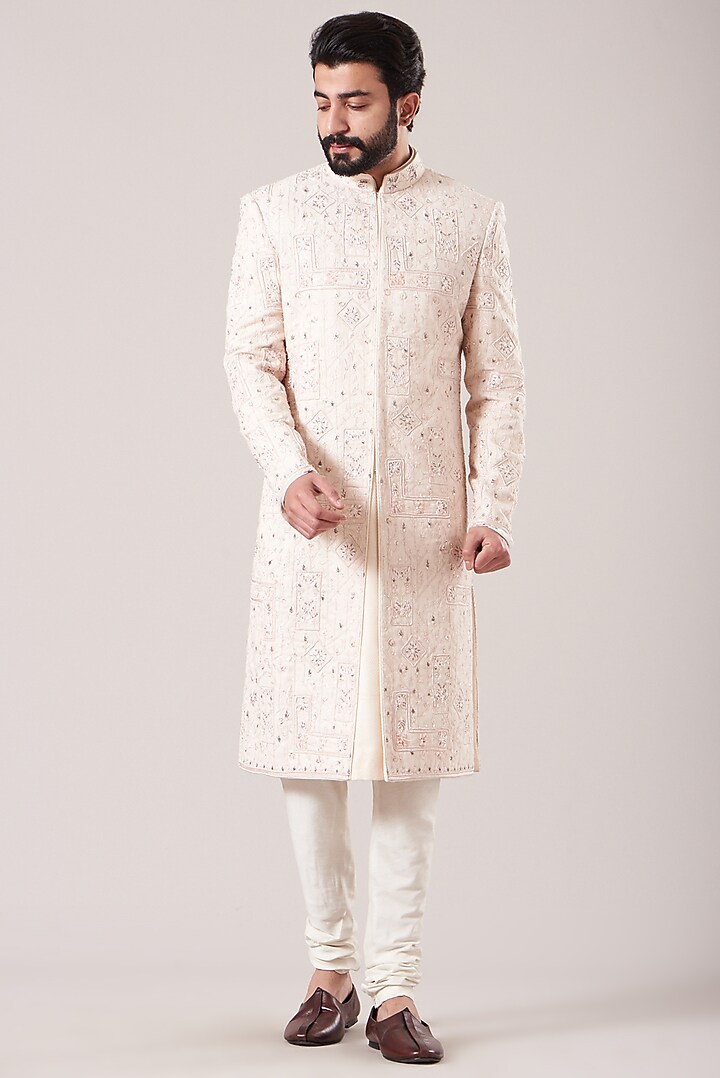 White Moonga Embroidered Groom Sherwani Set by Sarab Khanijou at Pernia's Pop Up Shop
