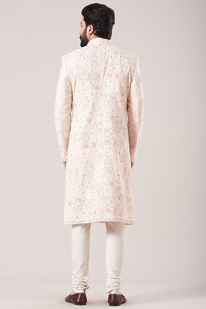 White Moonga Embroidered Groom Sherwani Set by Sarab Khanijou at Pernia's Pop Up Shop