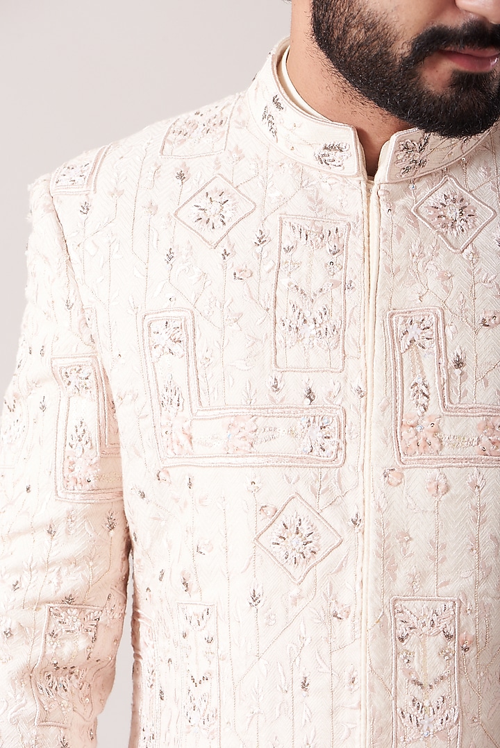 White Moonga Embroidered Groom Sherwani Set by Sarab Khanijou at Pernia's Pop Up Shop