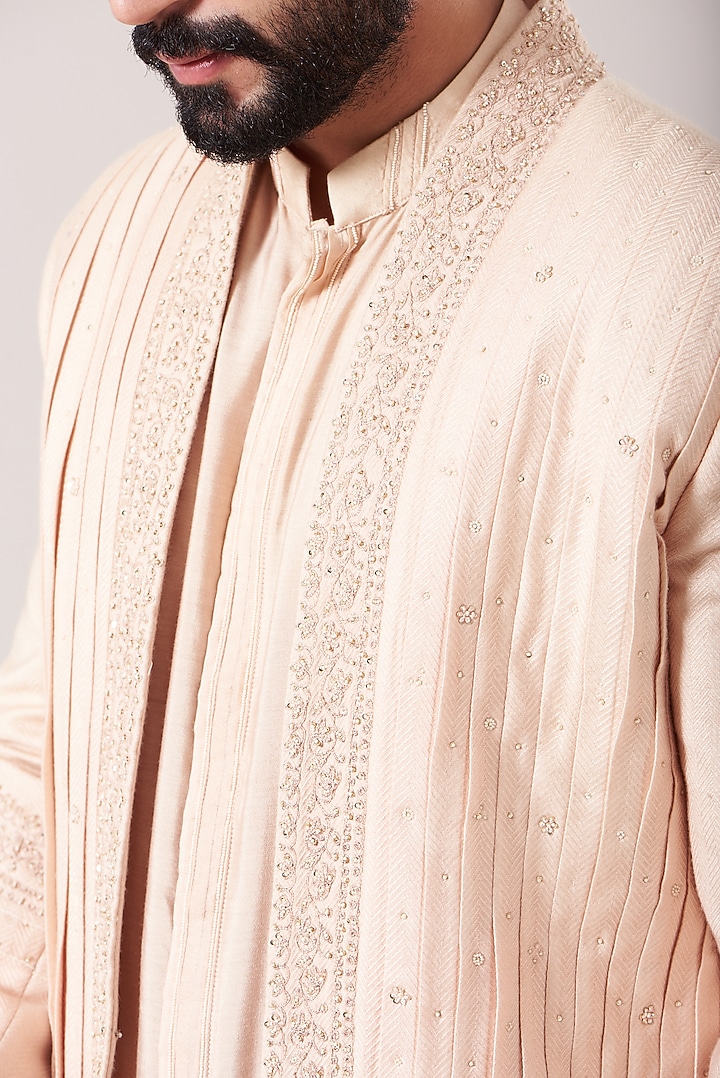 Dusty Rose Raw Silk Embroidered Groom Sherwani Set by Sarab Khanijou at Pernia's Pop Up Shop