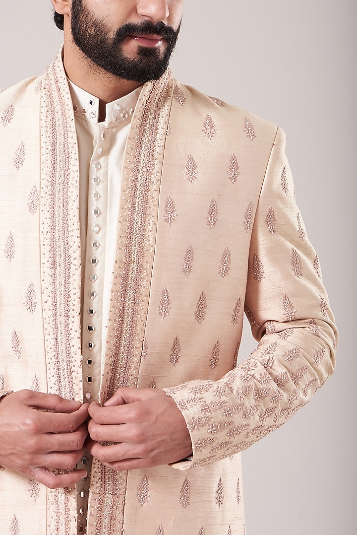 Dusty Rose Raw Silk Groom Sherwani Set by Sarab Khanijou at Pernia's Pop Up Shop