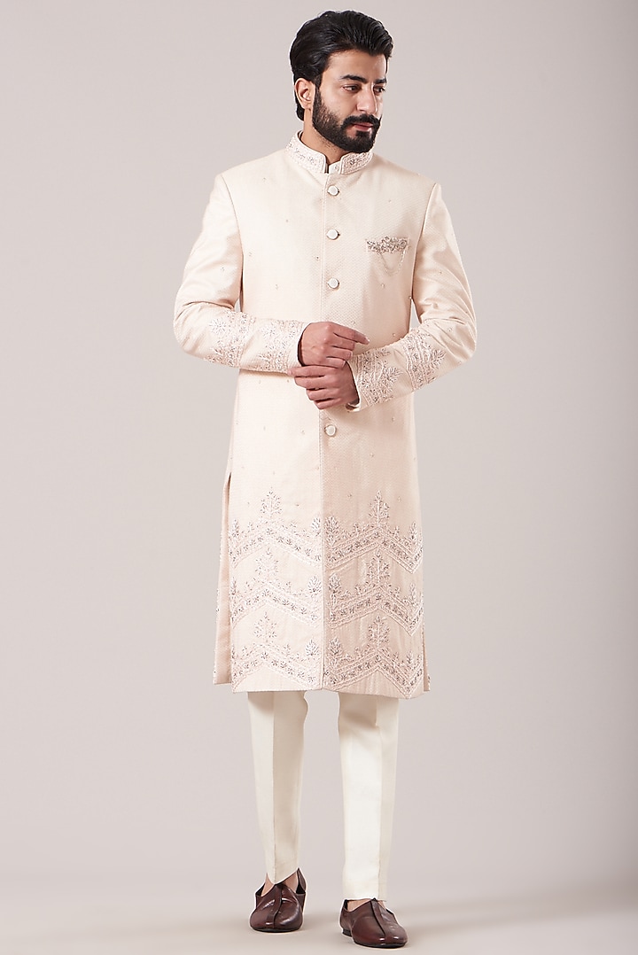 Peach Raw Silk Embroidered Groom Sherwani Set by Sarab Khanijou at Pernia's Pop Up Shop