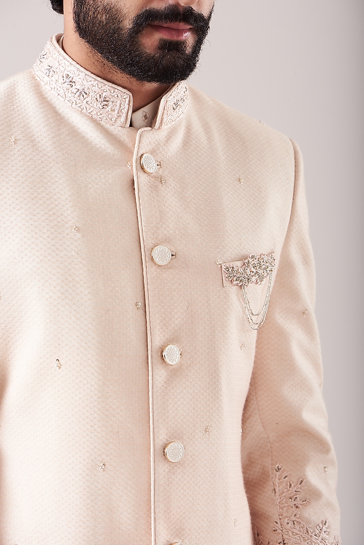 Peach Raw Silk Embroidered Groom Sherwani Set by Sarab Khanijou at Pernia's Pop Up Shop
