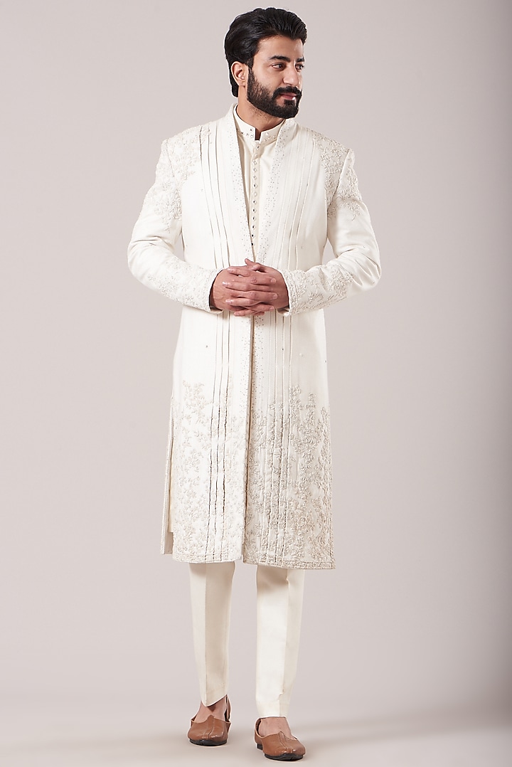 White Embroidered Front-Open Sherwani Set by Sarab Khanijou