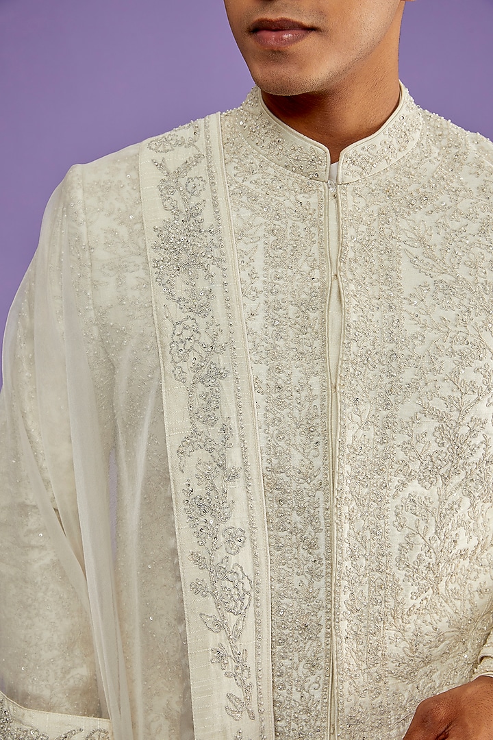 Ivory Raw Silk Embroidered Groom Sherwani Set by Sarab Khanijou at Pernia's Pop Up Shop