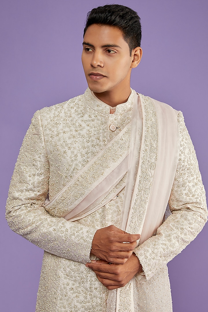 Onion Pink Raw Silk Embroidered Groom Sherwani Set by Sarab Khanijou at Pernia's Pop Up Shop