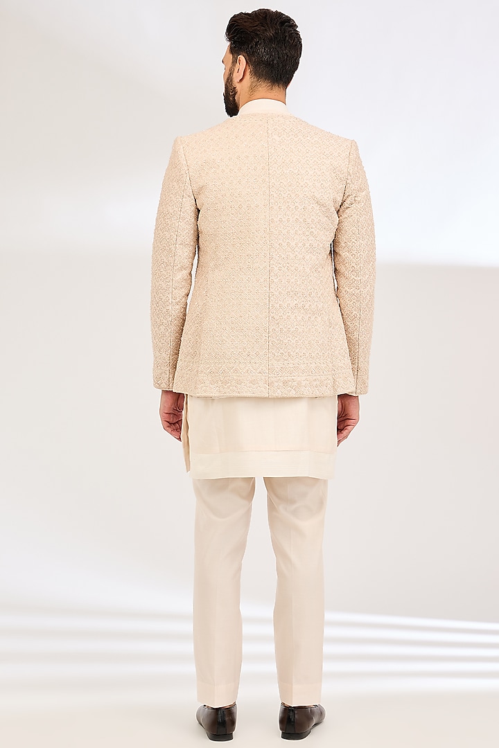 Peach Raw Silk Embroidered Groom Bandhgala Set by Sarab Khanijou at Pernia's Pop Up Shop