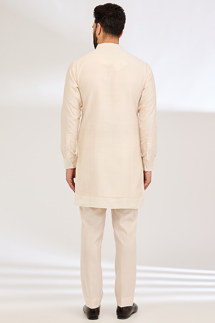 Peach Raw Silk Embroidered Groom Bandhgala Set by Sarab Khanijou at Pernia's Pop Up Shop