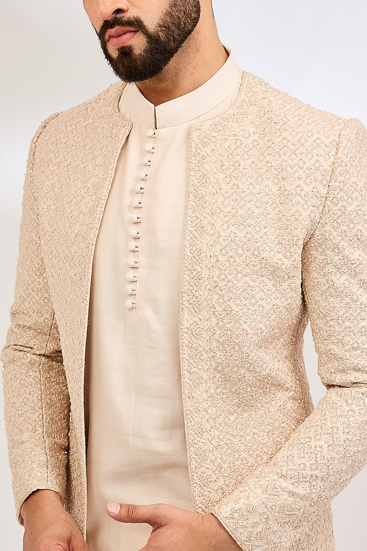 Peach Raw Silk Embroidered Groom Bandhgala Set by Sarab Khanijou at Pernia's Pop Up Shop