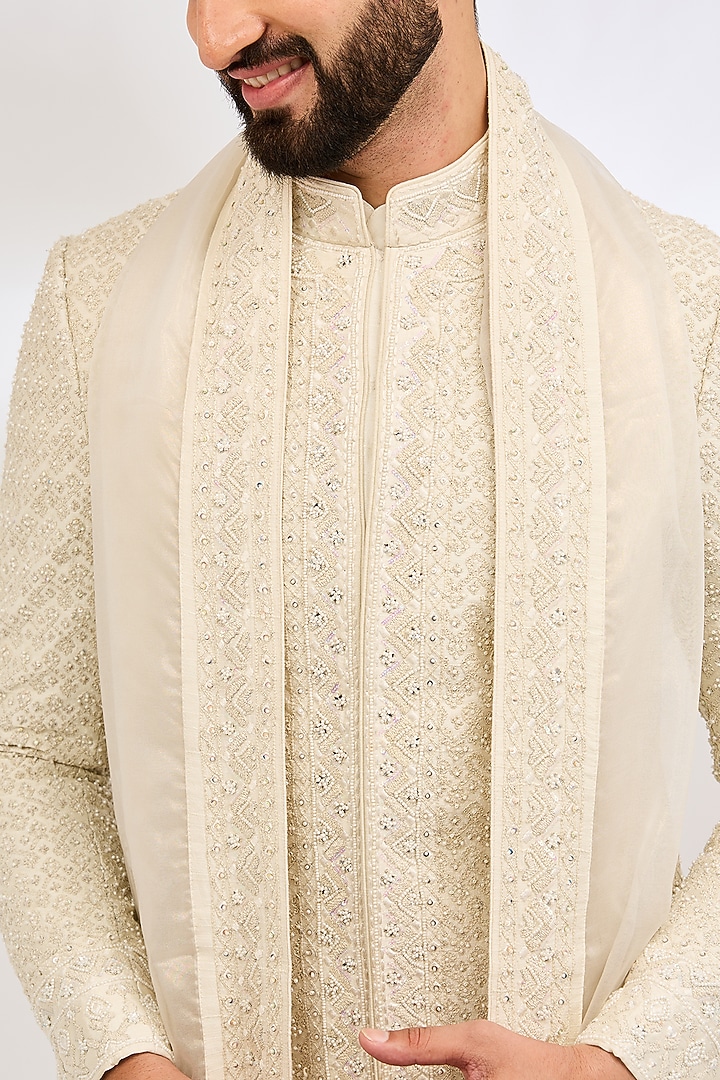 Ivory Raw Silk Jaal Embroidered Groom Sherwani Set by Sarab Khanijou at Pernia's Pop Up Shop