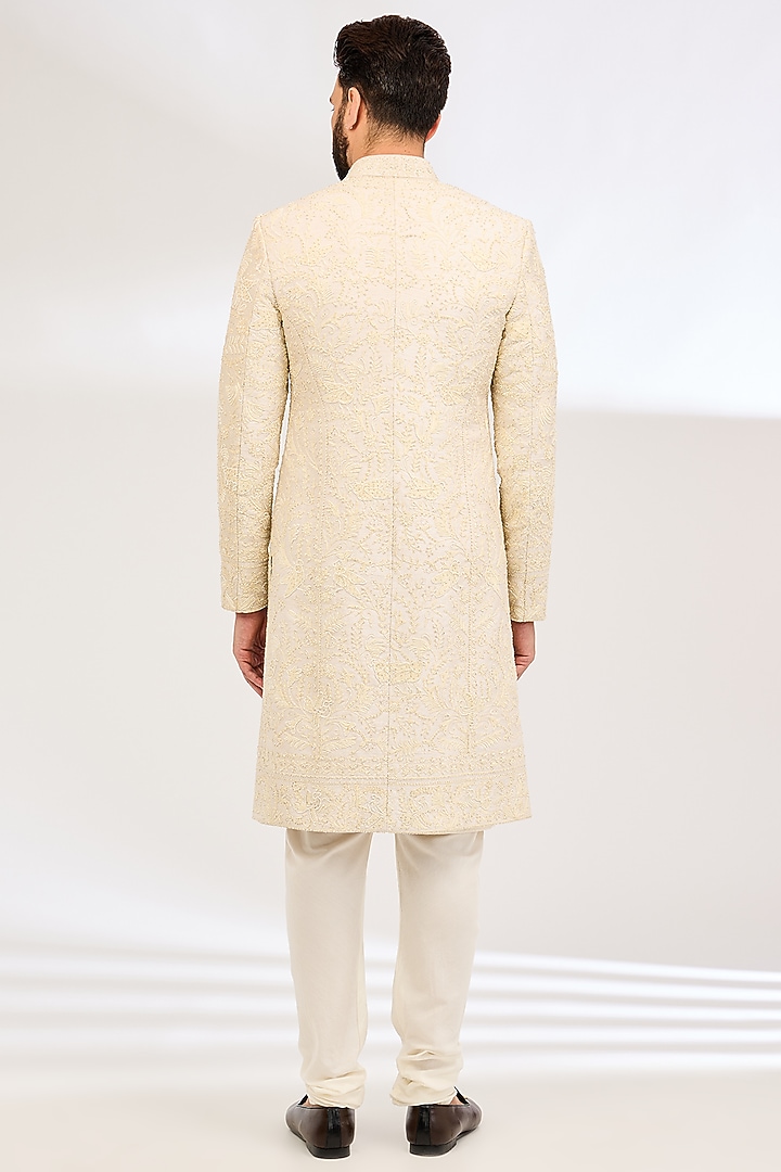 Ivory Raw Silk Thread Embroidered Groom Sherwani Set by Sarab Khanijou at Pernia's Pop Up Shop