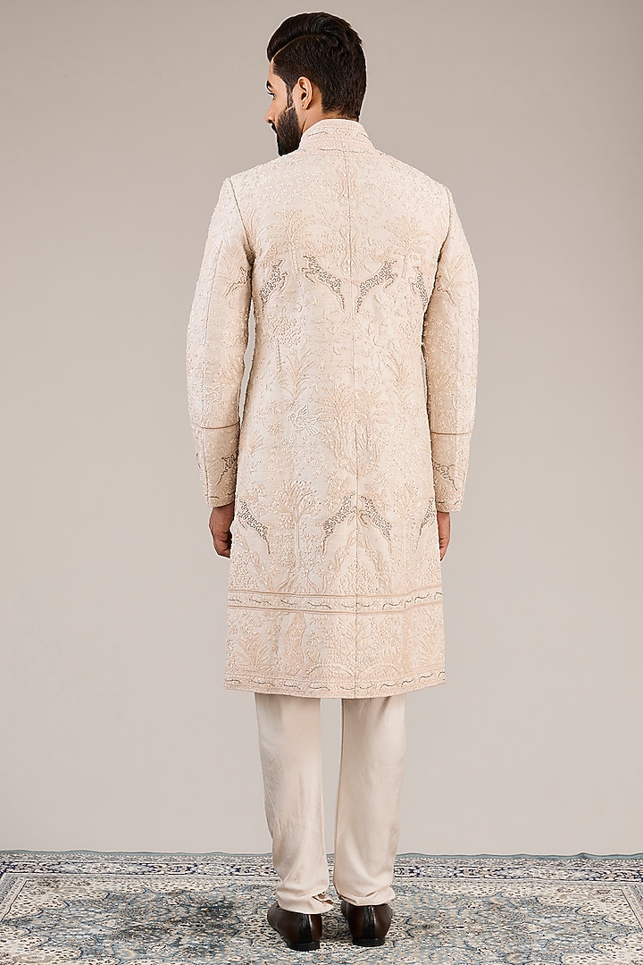 Onion Pink Raw Silk Zari Embroidered Groom Sherwani Set by Sarab Khanijou at Pernia's Pop Up Shop