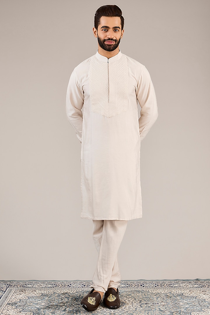 Onion Pink Raw Silk Zari Embroidered Groom Sherwani Set by Sarab Khanijou at Pernia's Pop Up Shop