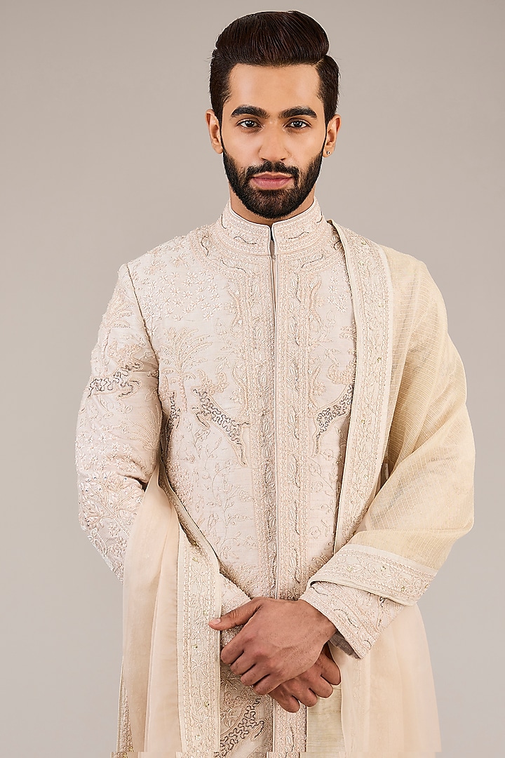Onion Pink Raw Silk Zari Embroidered Groom Sherwani Set by Sarab Khanijou at Pernia's Pop Up Shop