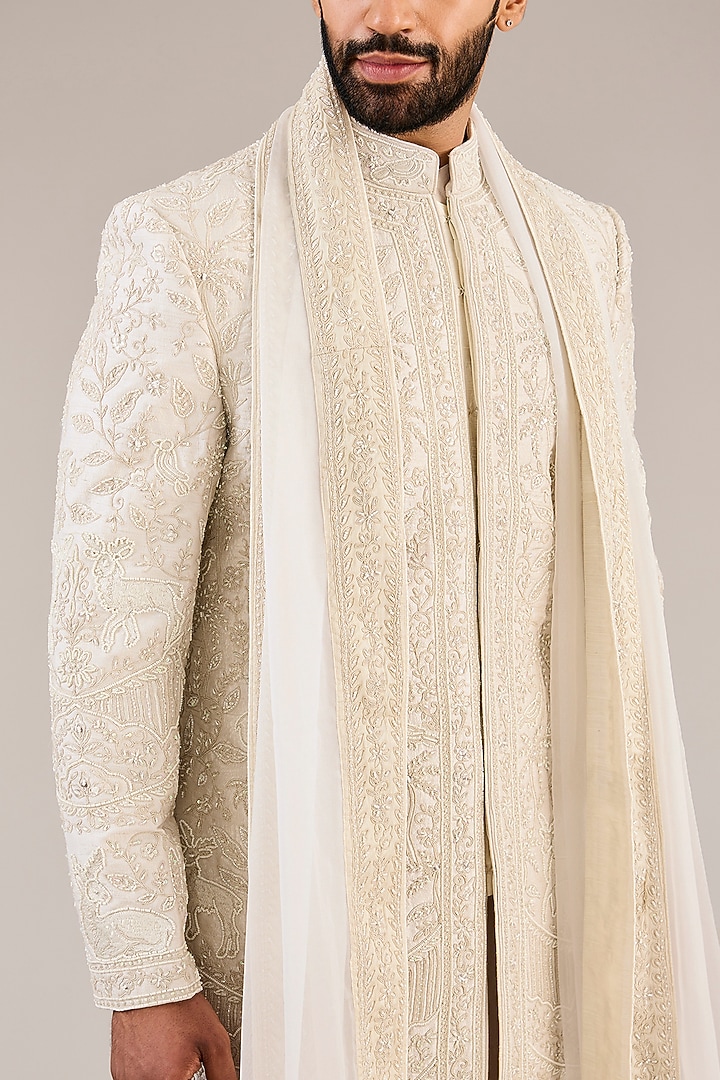 Ivory Raw Silk Zari Embroidered Groom Sherwani Set by Sarab Khanijou at Pernia's Pop Up Shop