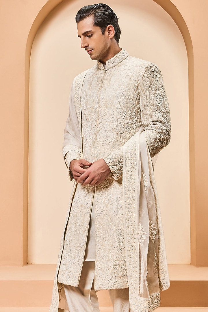 Ivory Raw Silk Threadwork Groom Sherwani Set by Sarab Khanijou at Pernia's Pop Up Shop