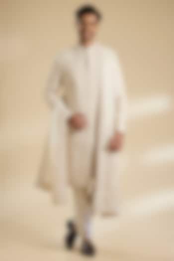 Ivory Raw Silk & Cotton Silk Sherwani Set by Sarab Khanijou