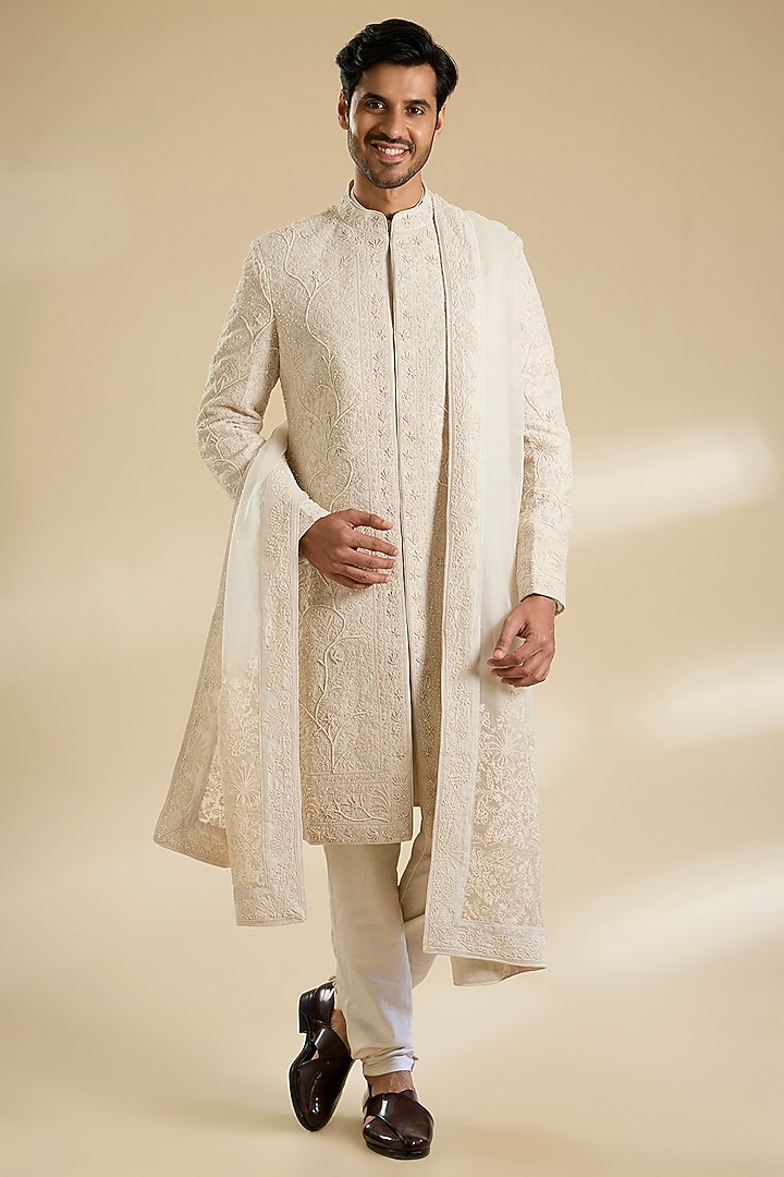 Ivory Raw Silk & Cotton Silk Sherwani Set by Sarab Khanijou