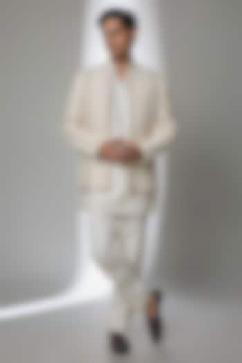 Ivory Raw Silk Groom Indowestern Set by Sarab Khanijou at Pernia's Pop Up Shop