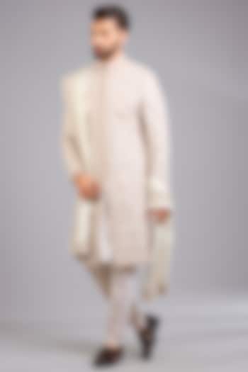Ivory Silk Groom Sherwani Set by Sarab Khanijou at Pernia's Pop Up Shop