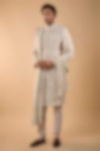 Ivory Silk Groom Sherwani Set by Sarab Khanijou at Pernia's Pop Up Shop