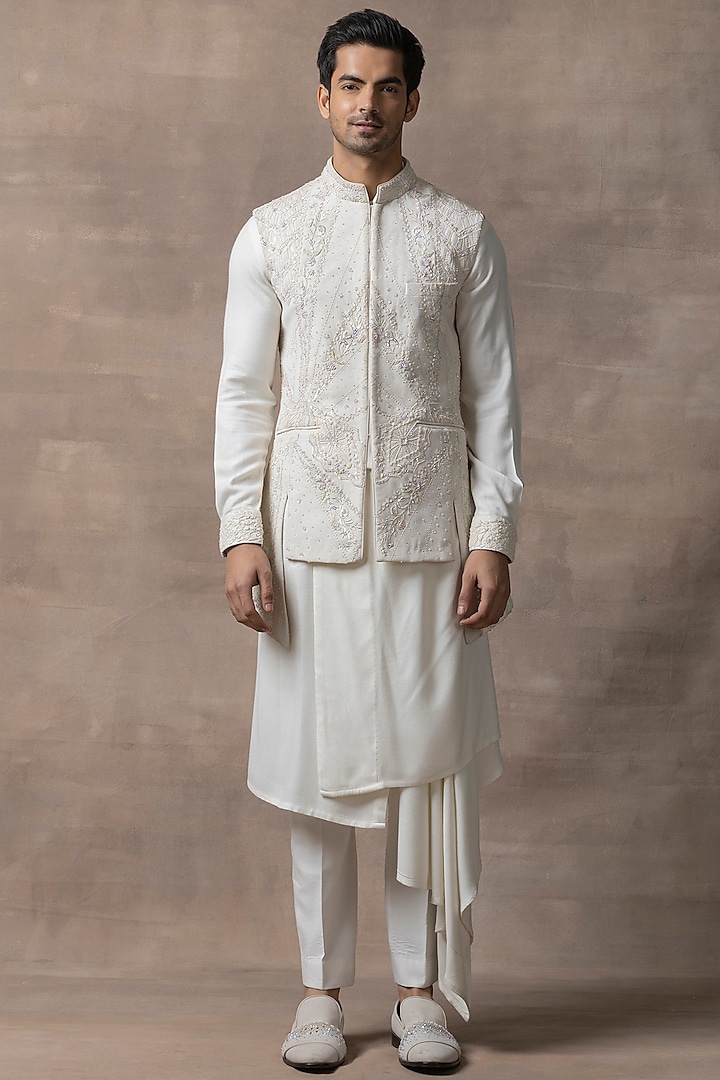 Ivory Sandwash & Silk Embroidered Waistcoat With Kurta Set by Sarab Khanijou