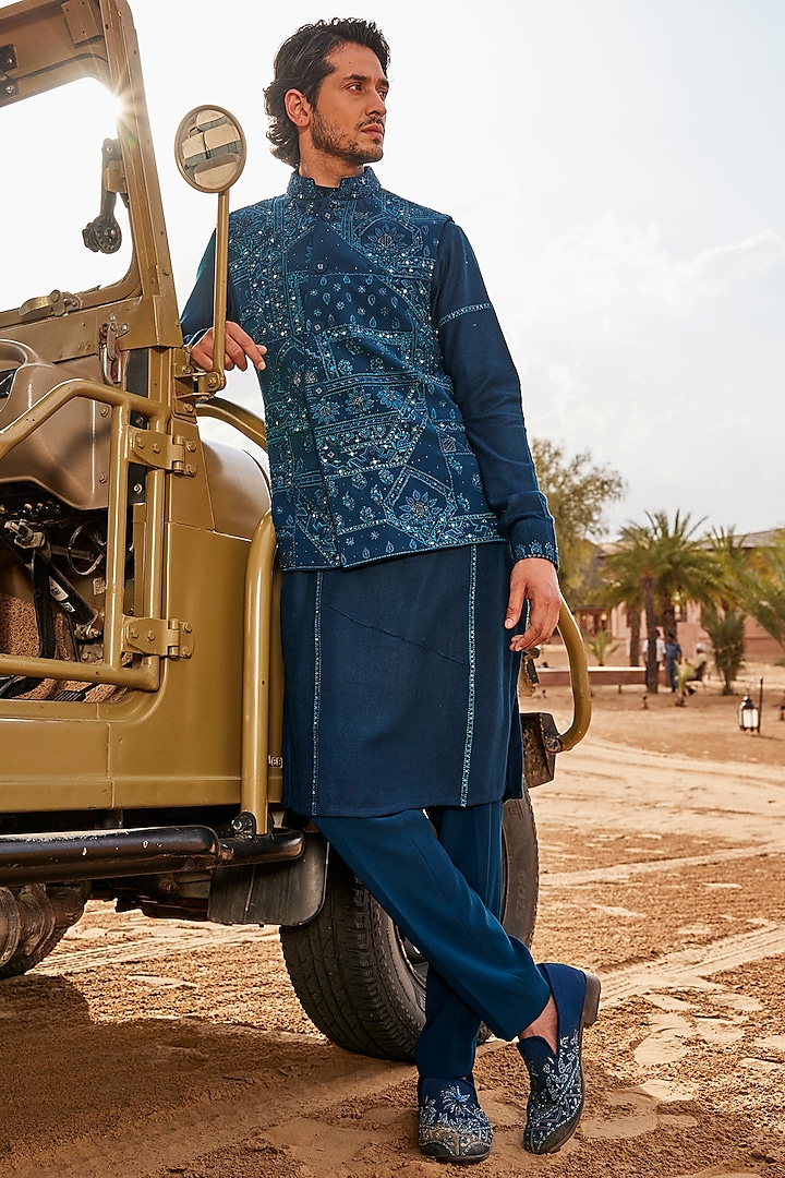 Teal Blue Silk & Sandwash Waistcoat With Kurta Set by Sarab Khanijou