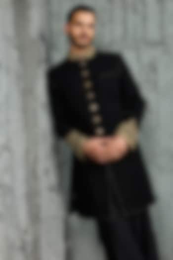 Black Textured Twill Hand Embroidered Groom Indowestern Set by Sarab Khanijou at Pernia's Pop Up Shop