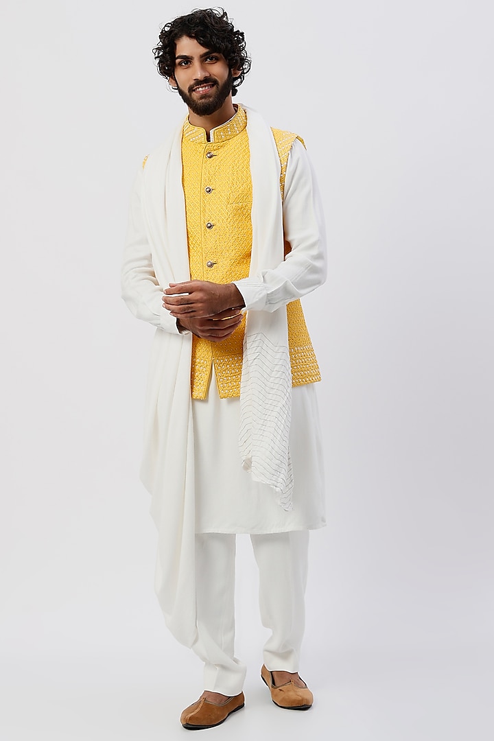 Yellow Embroidered Bundi Jacket With Kurta Set by Sarab Khanijou