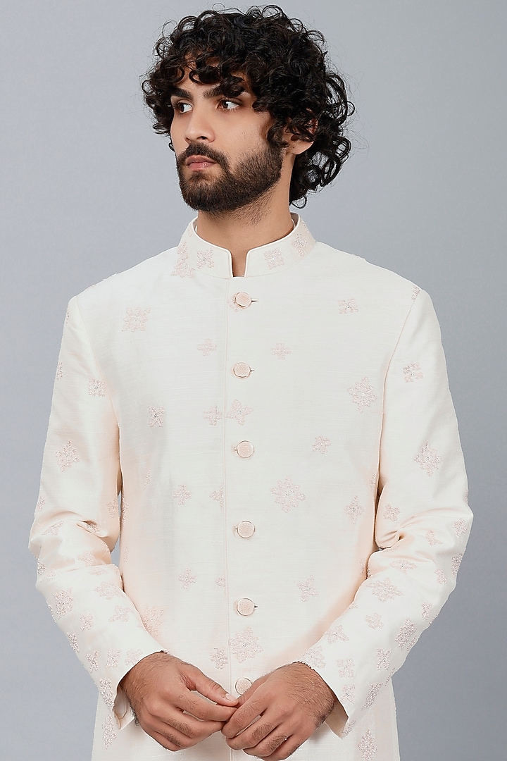 Nude-Peach Raw Silk French-Knot Embroidered Groom Sherwani Set by Sarab Khanijou at Pernia's Pop Up Shop