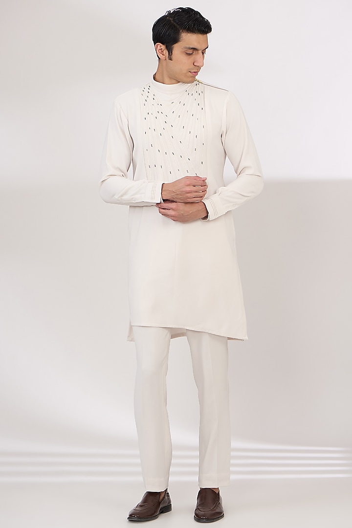 Ivory Sandwash Cutdana Embroidered Pintuck Kurta Set by Sarab Khanijou