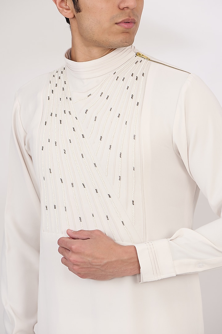 Ivory Sandwash Cutdana Embroidered Pintuck Kurta Set by Sarab Khanijou at Pernia's Pop Up Shop