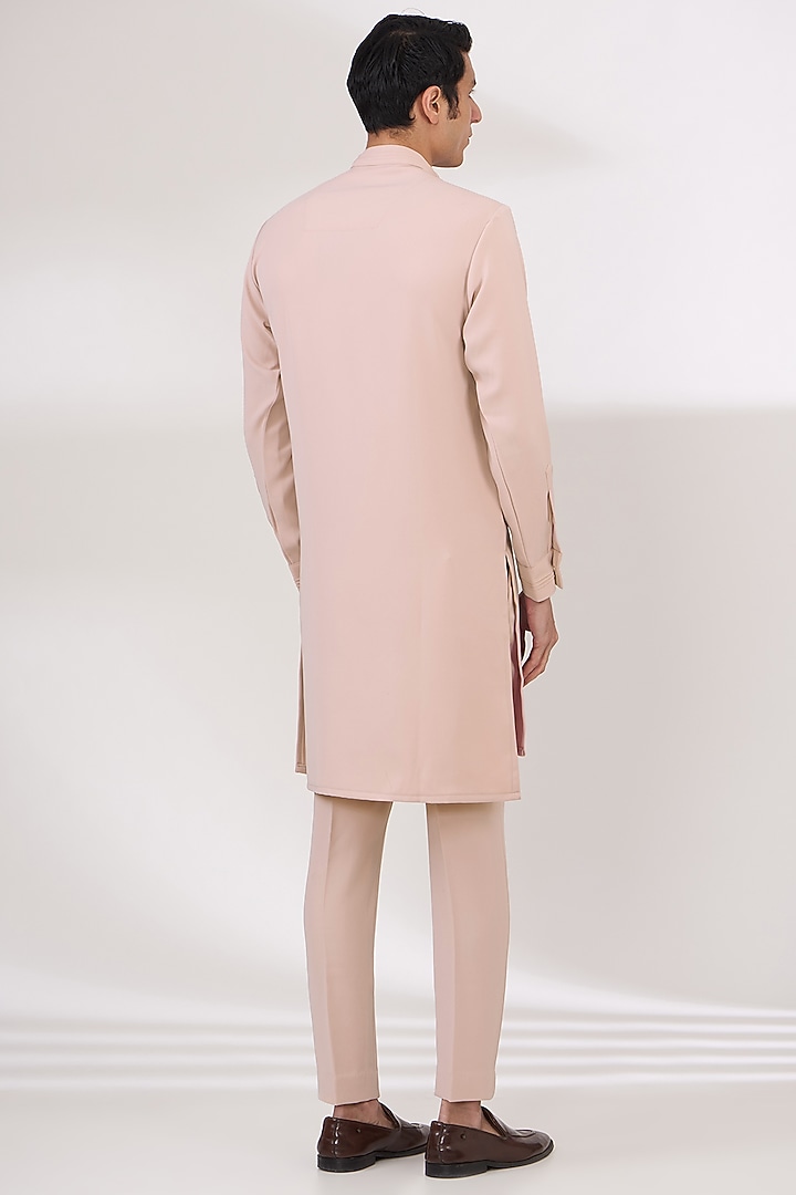 Peach Sandwash Pintuck Kurta Set by Sarab Khanijou at Pernia's Pop Up Shop