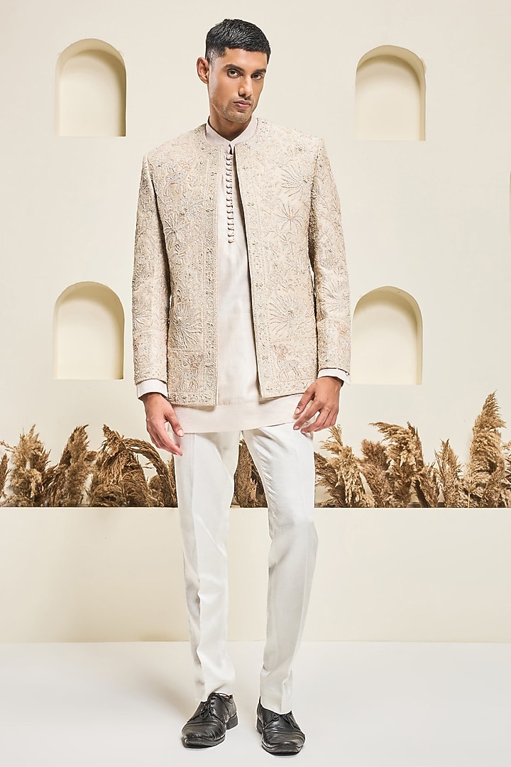 Dusty Rose Raw silk Threadwork Open Groom Bandhgala Set by Sarab Khanijou at Pernia's Pop Up Shop