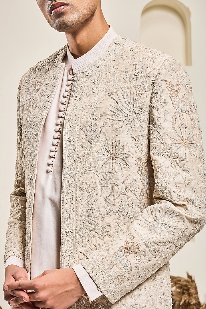 Dusty Rose Raw silk Threadwork Open Groom Bandhgala Set by Sarab Khanijou at Pernia's Pop Up Shop