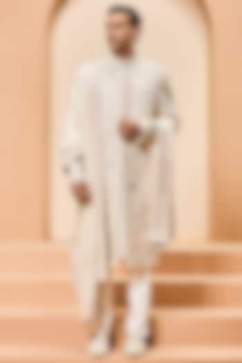 Ivory Matka Silk Threadwork Groom Sherwani Set by Sarab Khanijou at Pernia's Pop Up Shop