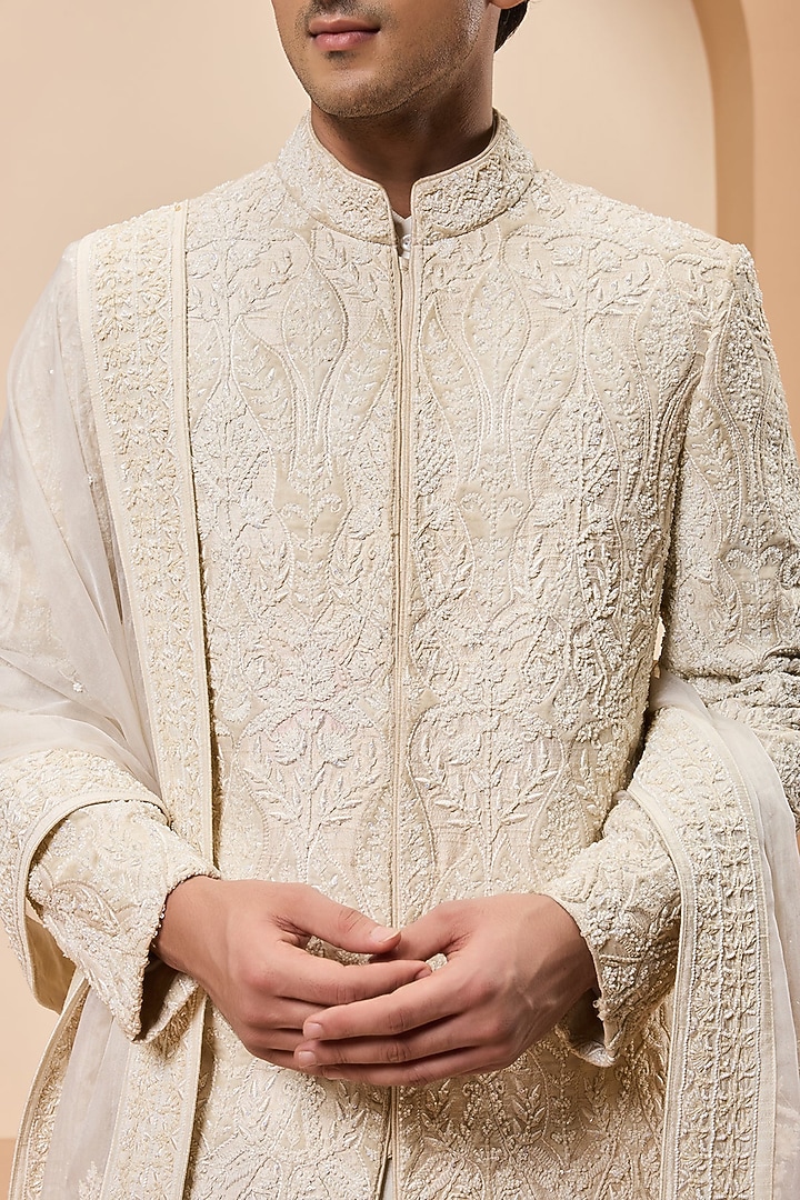 Ivory Raw Silk Threadwork Groom Sherwani Set by Sarab Khanijou at Pernia's Pop Up Shop