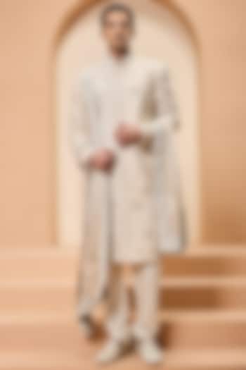 Ivory Raw Silk Cutdana Work Groom Sherwani Set by Sarab Khanijou at Pernia's Pop Up Shop