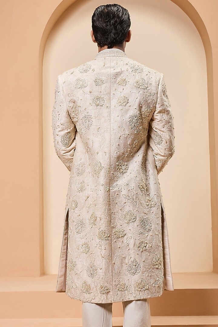 Ivory Raw Silk Cutdana Work Groom Sherwani Set by Sarab Khanijou at Pernia's Pop Up Shop