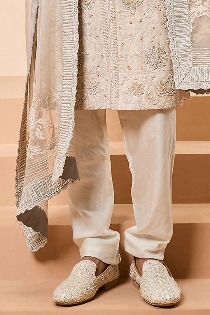 Ivory Raw Silk Cutdana Work Groom Sherwani Set by Sarab Khanijou at Pernia's Pop Up Shop