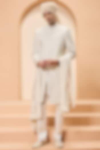 Ivory Raw Silk Thread Work Groom Sherwani Set by Sarab Khanijou at Pernia's Pop Up Shop