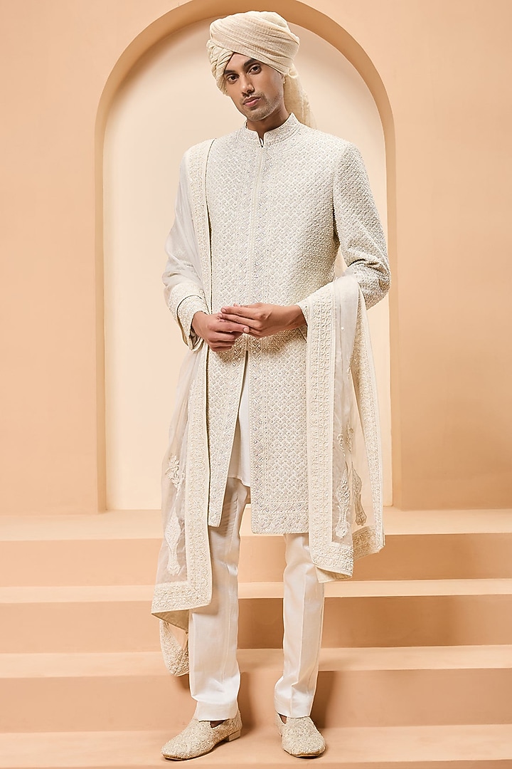 Ivory Raw Silk Thread Work Groom Sherwani Set by Sarab Khanijou at Pernia's Pop Up Shop