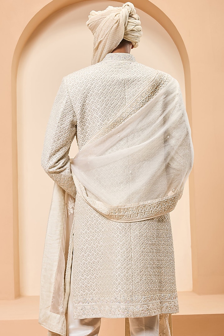 Ivory Raw Silk Thread Work Groom Sherwani Set by Sarab Khanijou at Pernia's Pop Up Shop