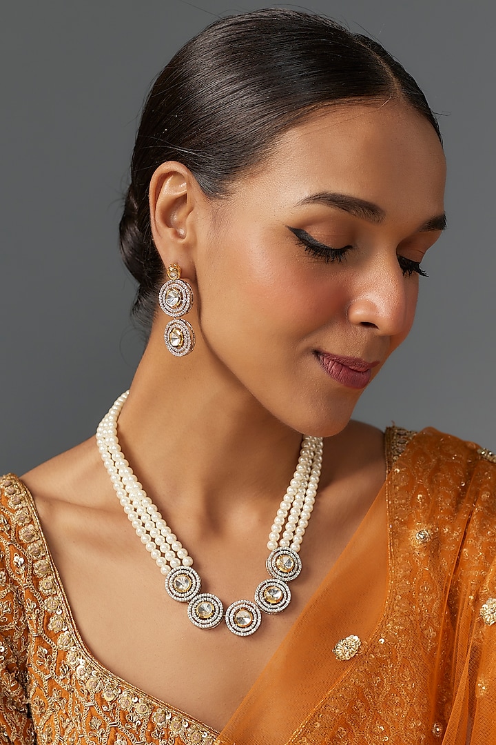 Gold Finish Kundan Polki & Shell Pearl Necklace Set by Jovi Jewels at Pernia's Pop Up Shop