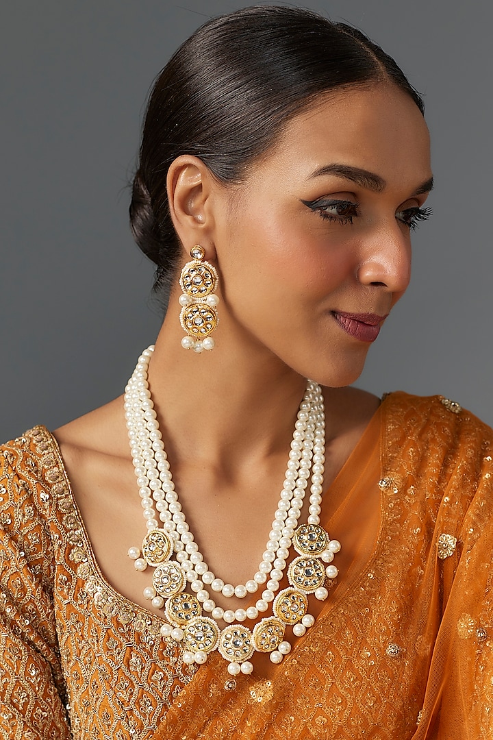 Gold Finish Kundan Polki & Shell Pearl Necklace Set by Jovi Jewels at Pernia's Pop Up Shop