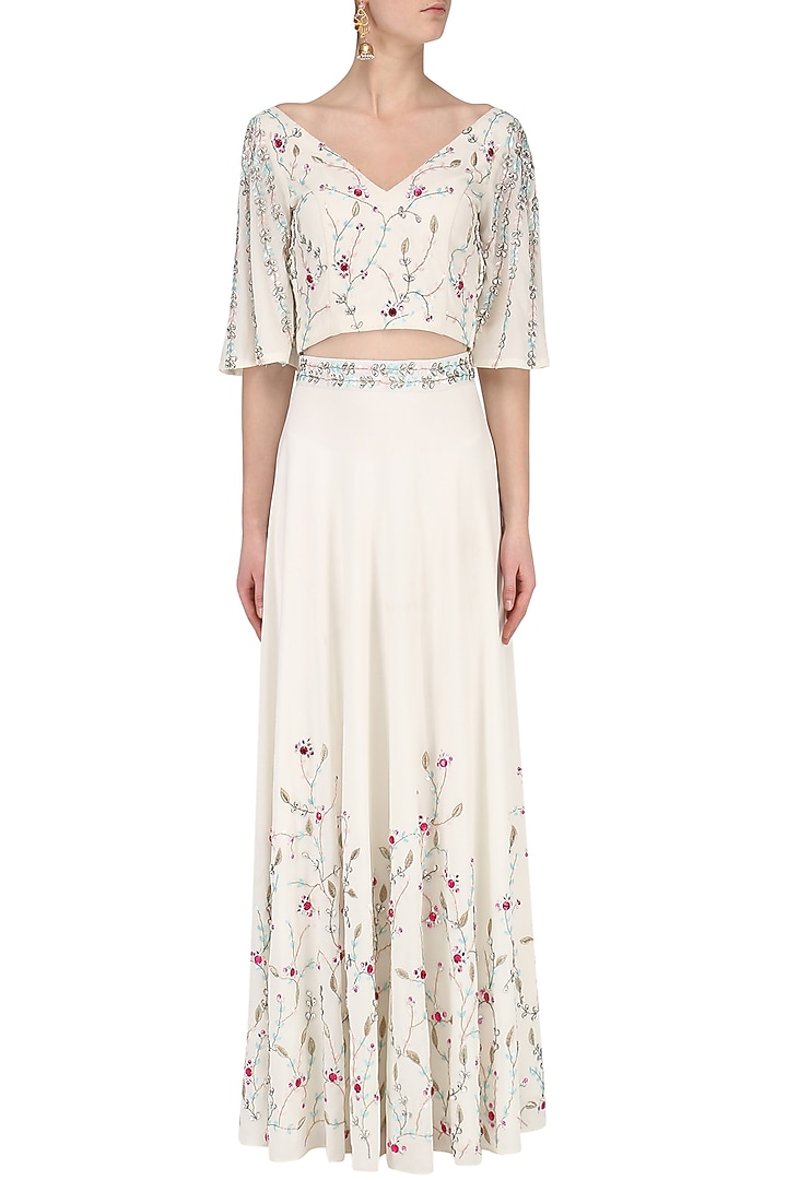 White Embroidered Lehenga And Crop Top available only at Pernia's Pop Up Shop.