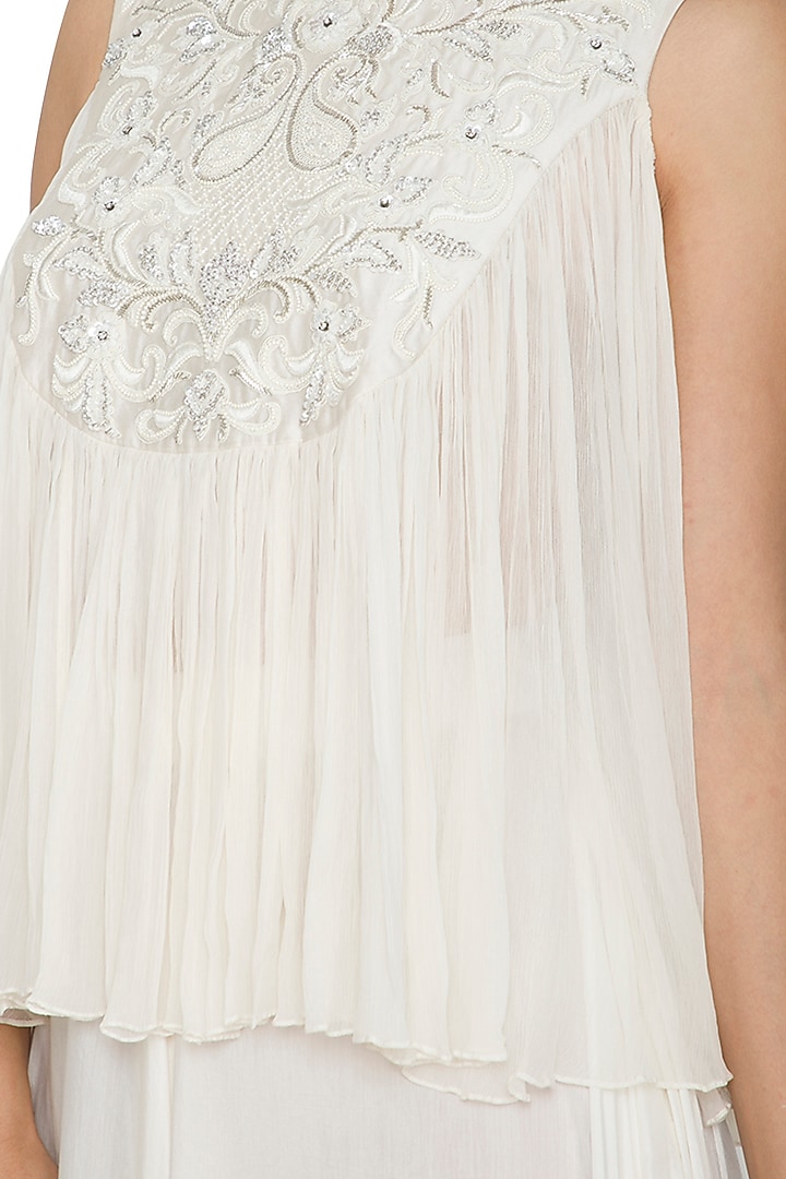 White Embroidered Flared Top by Jyoti Sachdev Iyer at Pernia's Pop Up Shop